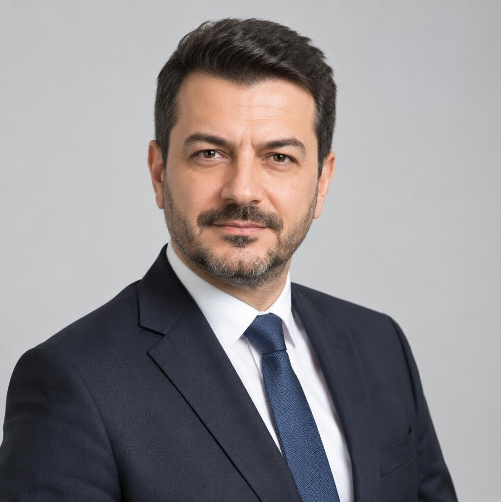 Professional portrait of a confident businessman with a beard